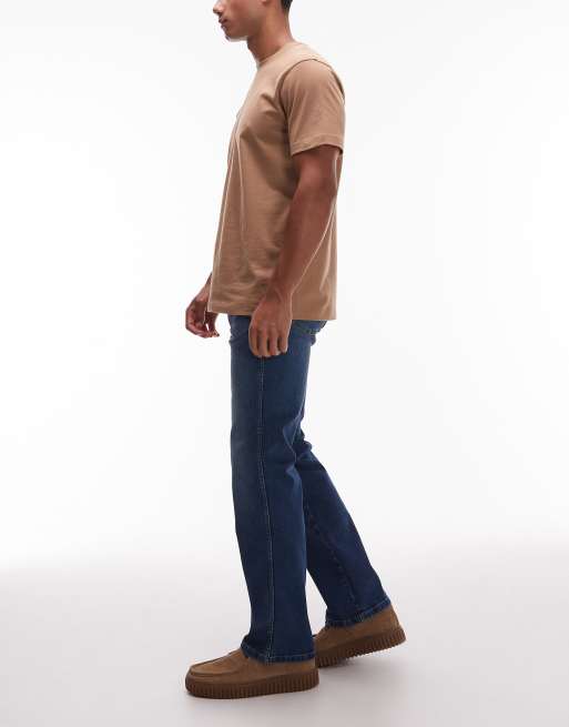 Wrangler Wrancher slim bootcut fit jeans in midwash blue, 3 of 5