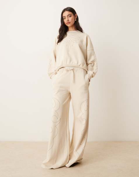 Wrangler x Lainey Wilson cowboy co-ord sweatshirt and joggers in ecru - view 1