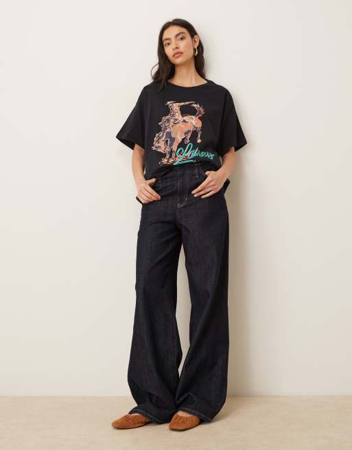 Wrangler x Lainey Wilson oversized cowboy t-shirt in black, 3 of 4