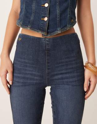 Wrangler X Lainey Wilson Stretch Denim Flared Jeans With Elastic Waistband In Blue