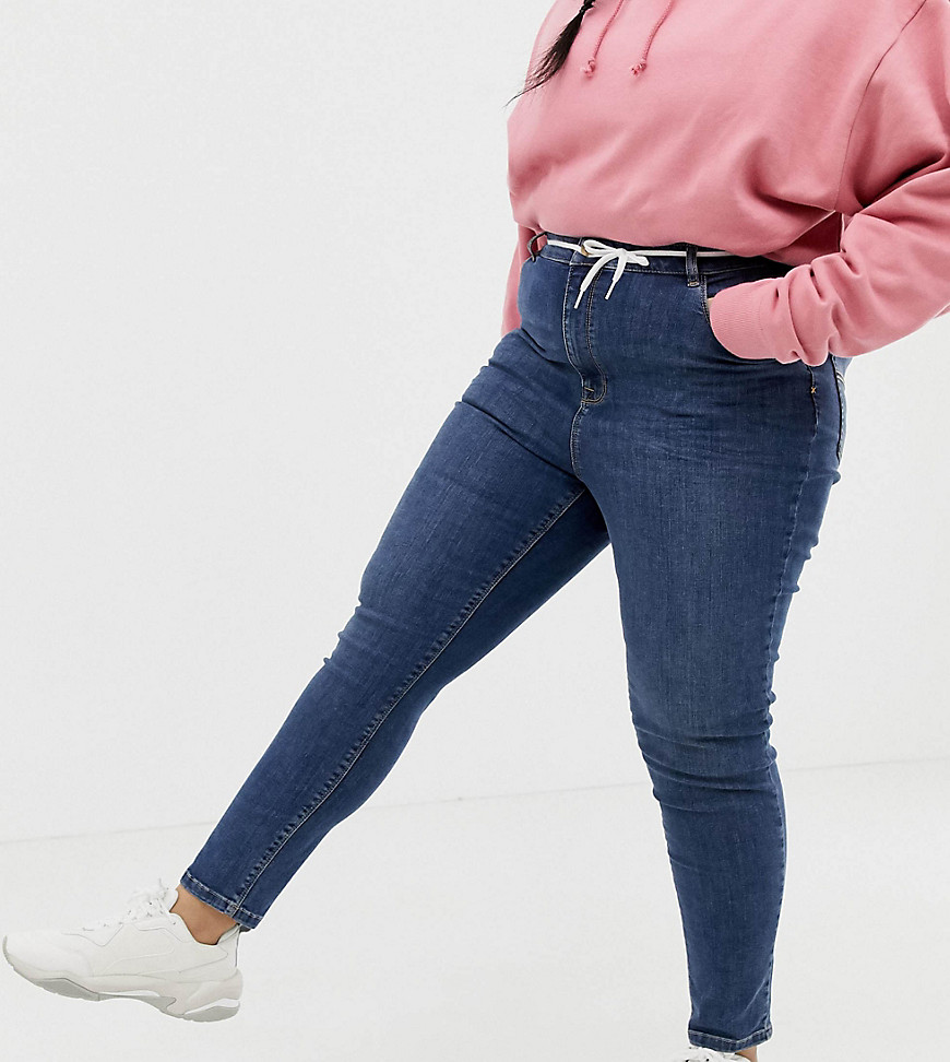 X001 Medium forvaskede, skinny jeans fra COLLUSION Plus-Blå