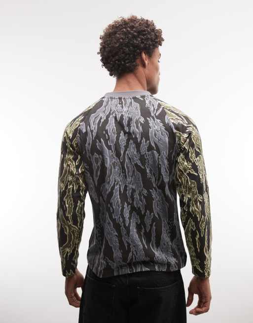 XLARGE - Camiseta negra de manga larga raglán con estampado de camuflaje Nu Age, 5 de 5