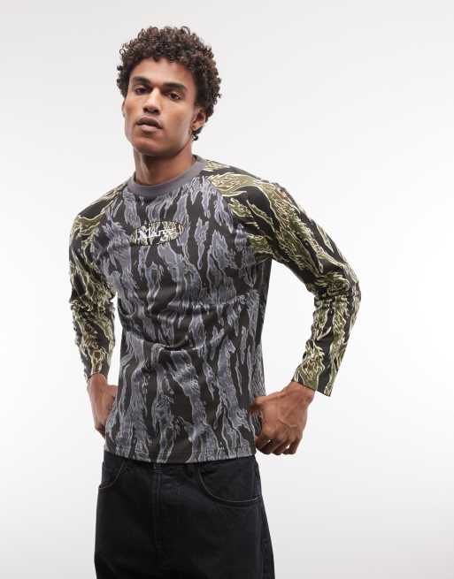 XLARGE – Nu Age – Svart, kamouflagemönstrad t-shirt med långa raglanärmar, 3 av 5