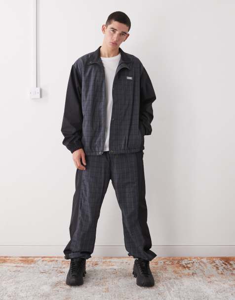 XLARGE - Tuta sportiva color block grigia e nera a quadri con logo - view 1