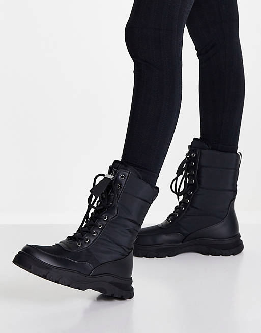 XTI lace up snow boots in black
