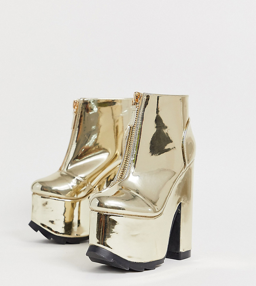 Y-R-U - heeled boots with plateau Soles in gold