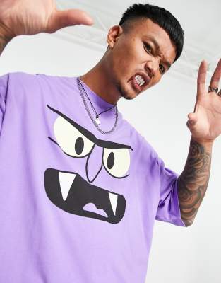 Футболки с принтом Ярко-фиолетовая oversized-футболка на Хэллоуин с принтом монстров ASOS DESIGN-Фиолетовый цвет