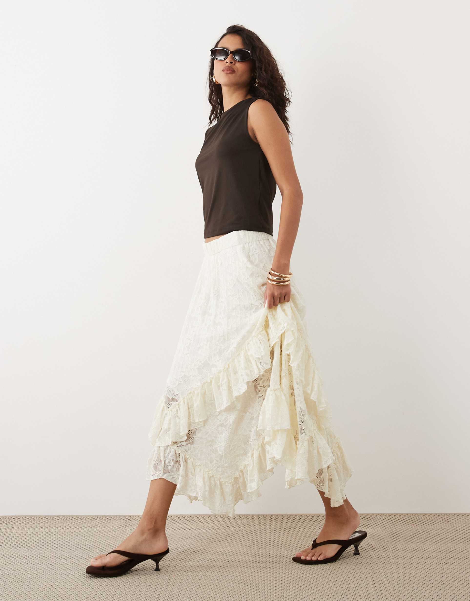 yas all over lace ruffle trim handkerchief hem skirt in cream