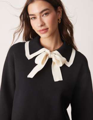 bow neck long sleeve knit top in black