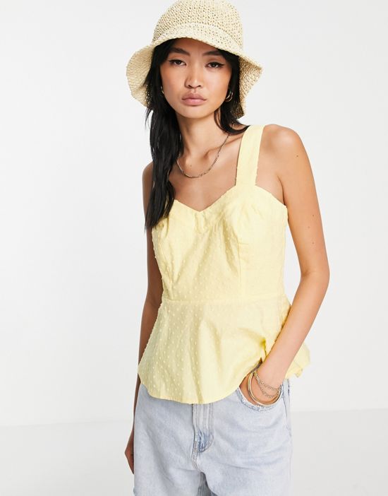 https://images.asos-media.com/products/yas-cotton-sleeveless-blouse-in-pale-yellow/23886969-3?$n_550w$&wid=550&fit=constrain