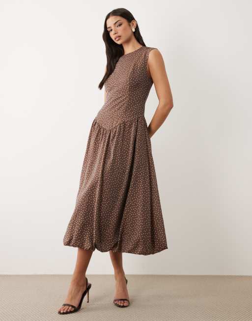 YAS fitted seam detail drop waist sleeveless midi dress in chocolate polka  dot print | ASOS