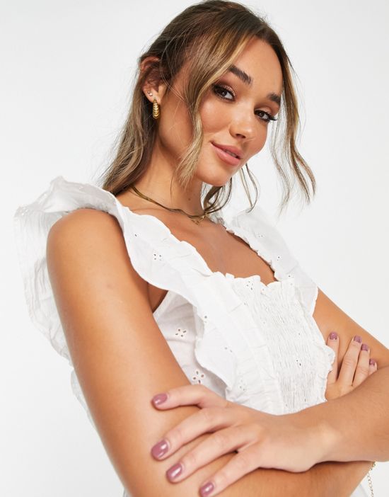 https://images.asos-media.com/products/yas-frill-detail-sleeveless-blouse-in-white/202797019-3?$n_550w$&wid=550&fit=constrain