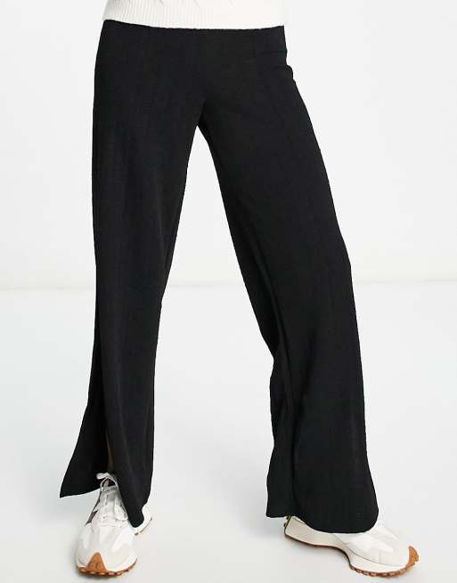 Black trousers with cheap sparkle stripe