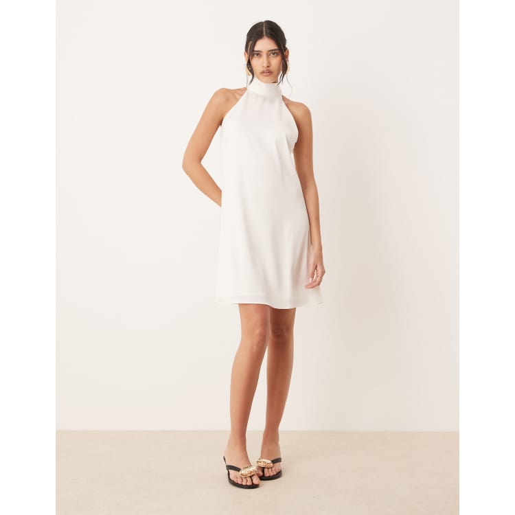 YAS halterneck mini dress with bow back in white | ASOS