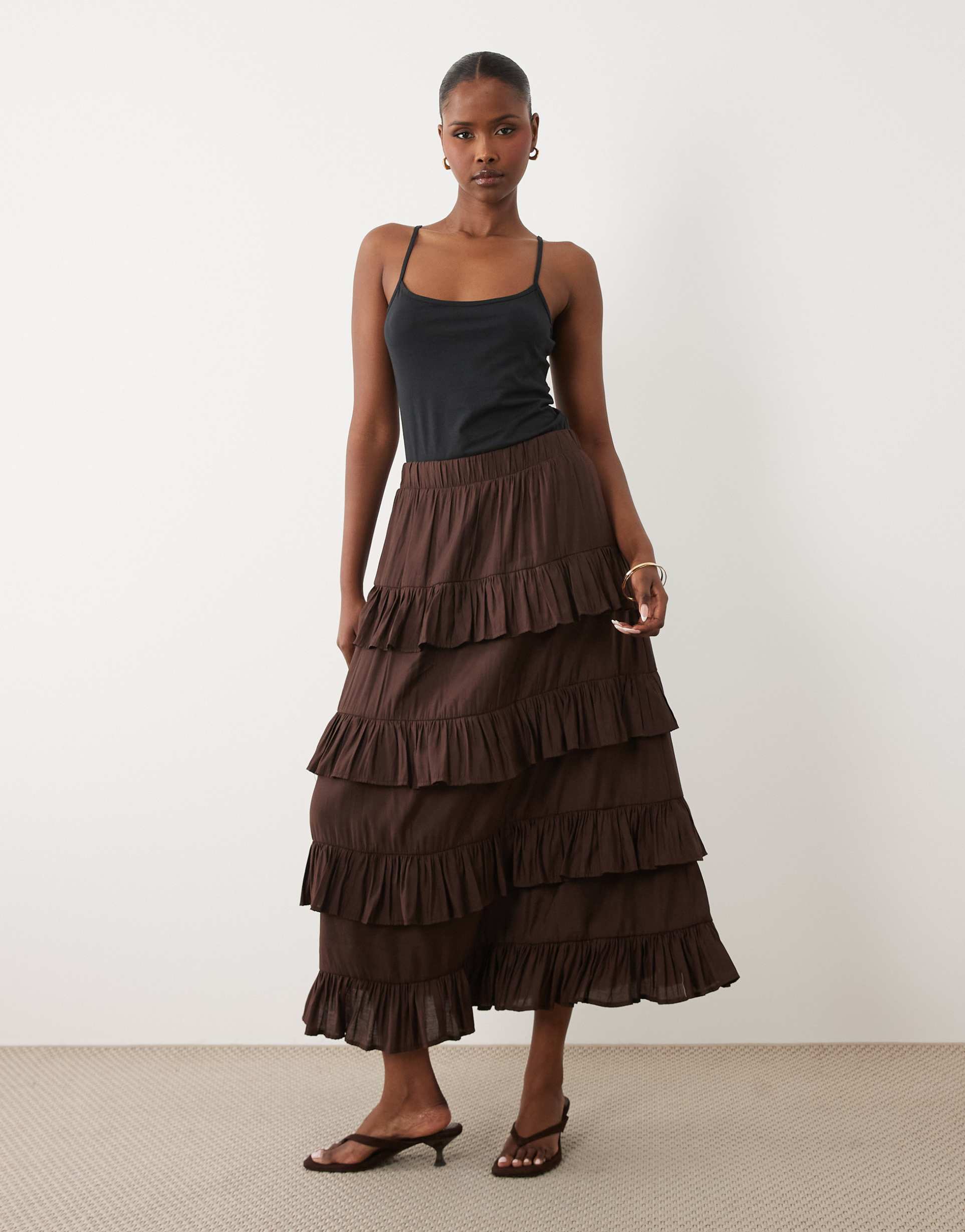 yas high waisted tiered ruffle maxi skirt in chocolate