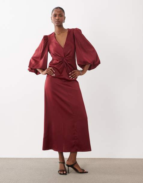 YAS jurk met knoopdetail vooraan, volumemouwen en satijnen midi in rood - view 1