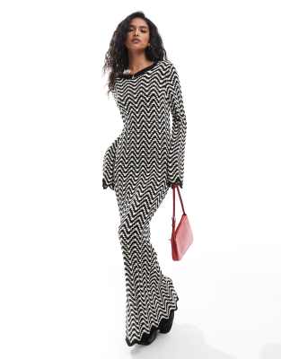 knitted maxi dress with lettuce edge in black and white stripe