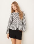 [YAS] YAS lace overlay detail tie front peplum hem top in black and white gingham 10 Black_Cellichecks