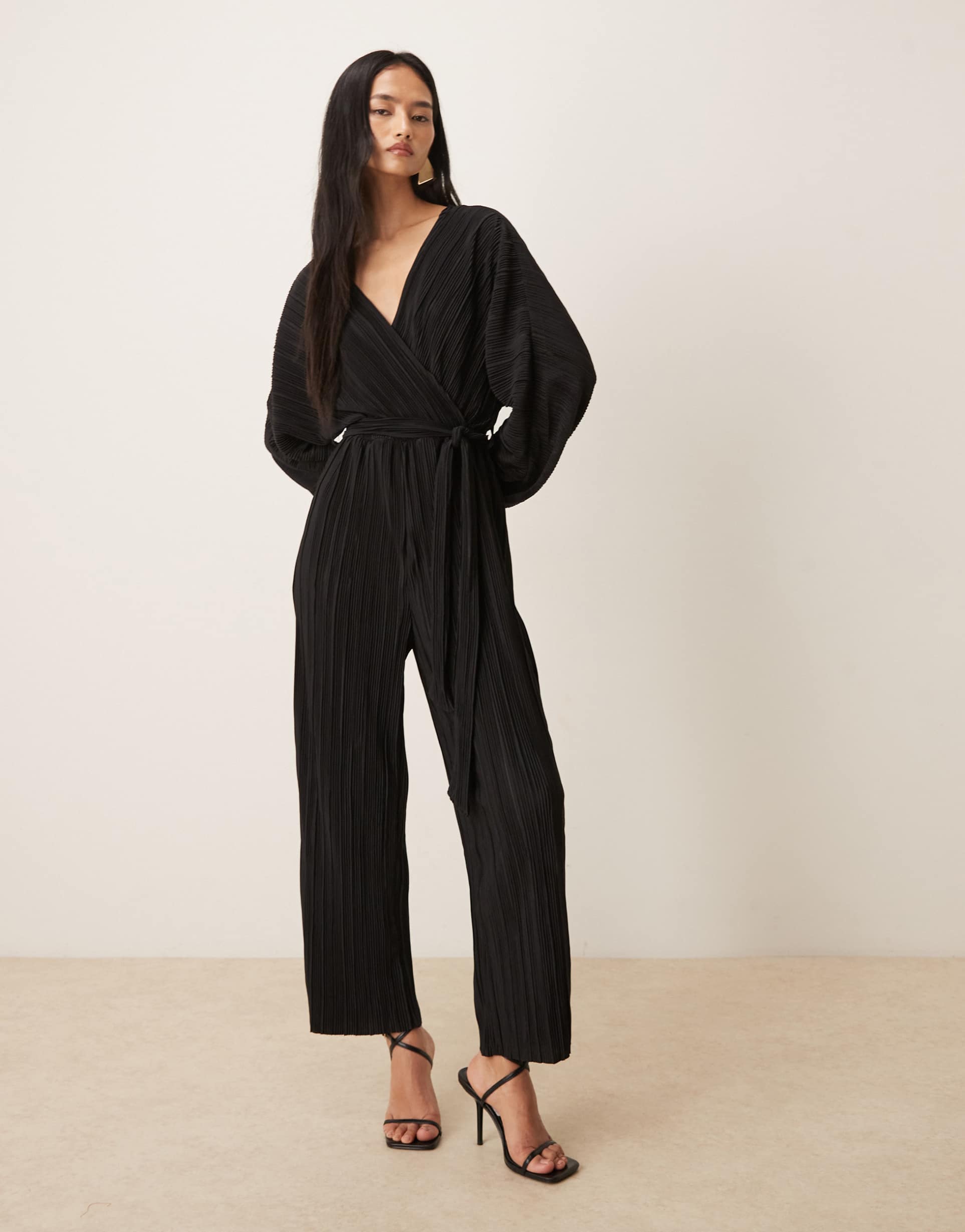 yas long sleeve tie waist plisse jumpsuit in black