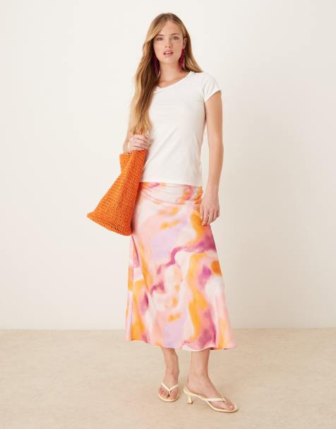 YAS – Midirock mit verschwommenem Muster in Rosa und Orange - view 1