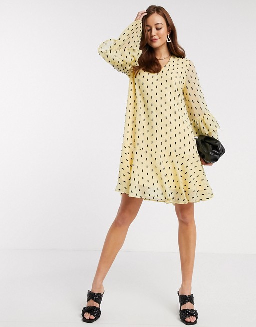 Y.A.S mini smock dress with frill sleeve detail in black spot