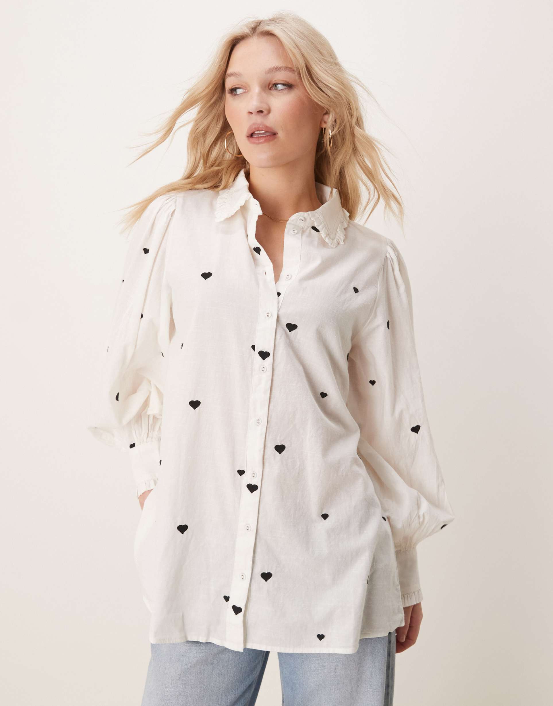 yas oversized shirt with heart embroidery and ruffle trim detail in white