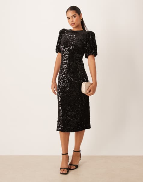 YAS – Pailletten-Midikleid in Schwarz mit Puffärmeln - view 1