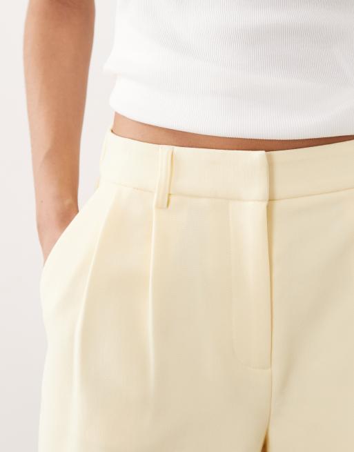YAS pleated tailored shorts co-ord in pale yellow, 4 of 5
