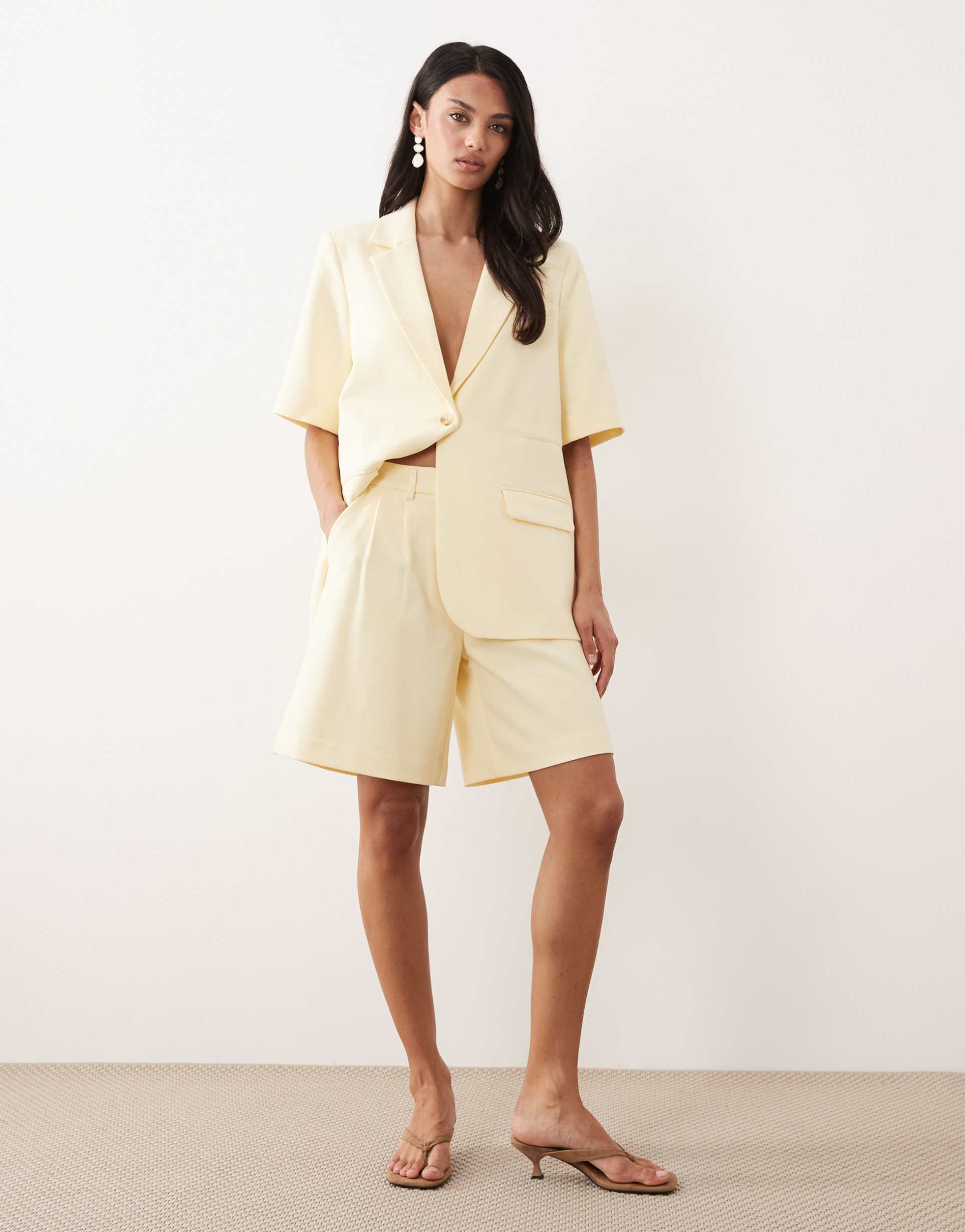yas pleated tailored shorts in pale yellow - part of a set