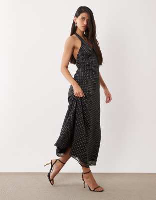 YAS polka dot halter neck maxi dress in black and white