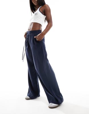 premium soft touch wide leg pant with tie waist in navy-Blue