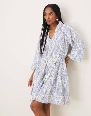 puff sleeve boho mini dress with tie waist detail in blue and white tile print
