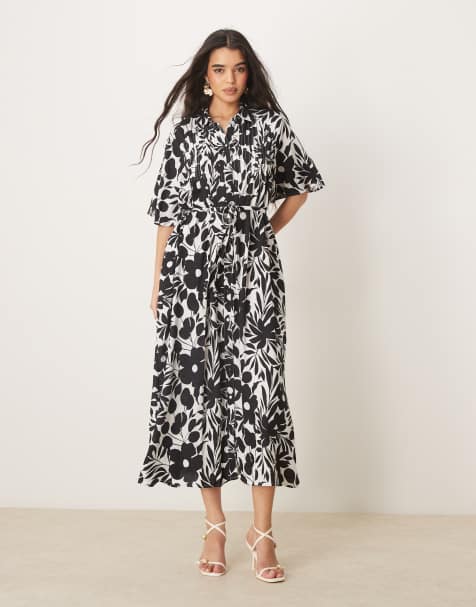 YAS - Robe boutonnée devant à ceinture et manches évasées - Noir et blanc fleuri - view 1