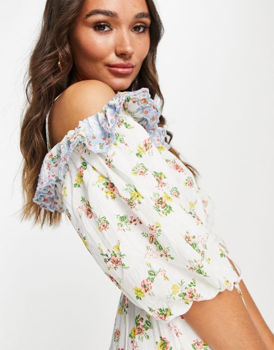 https://images.asos-media.com/products/yas-ruffle-detail-mini-dress-in-mixed-floral/202802392-4?$n_550w$&wid=550&fit=constrain