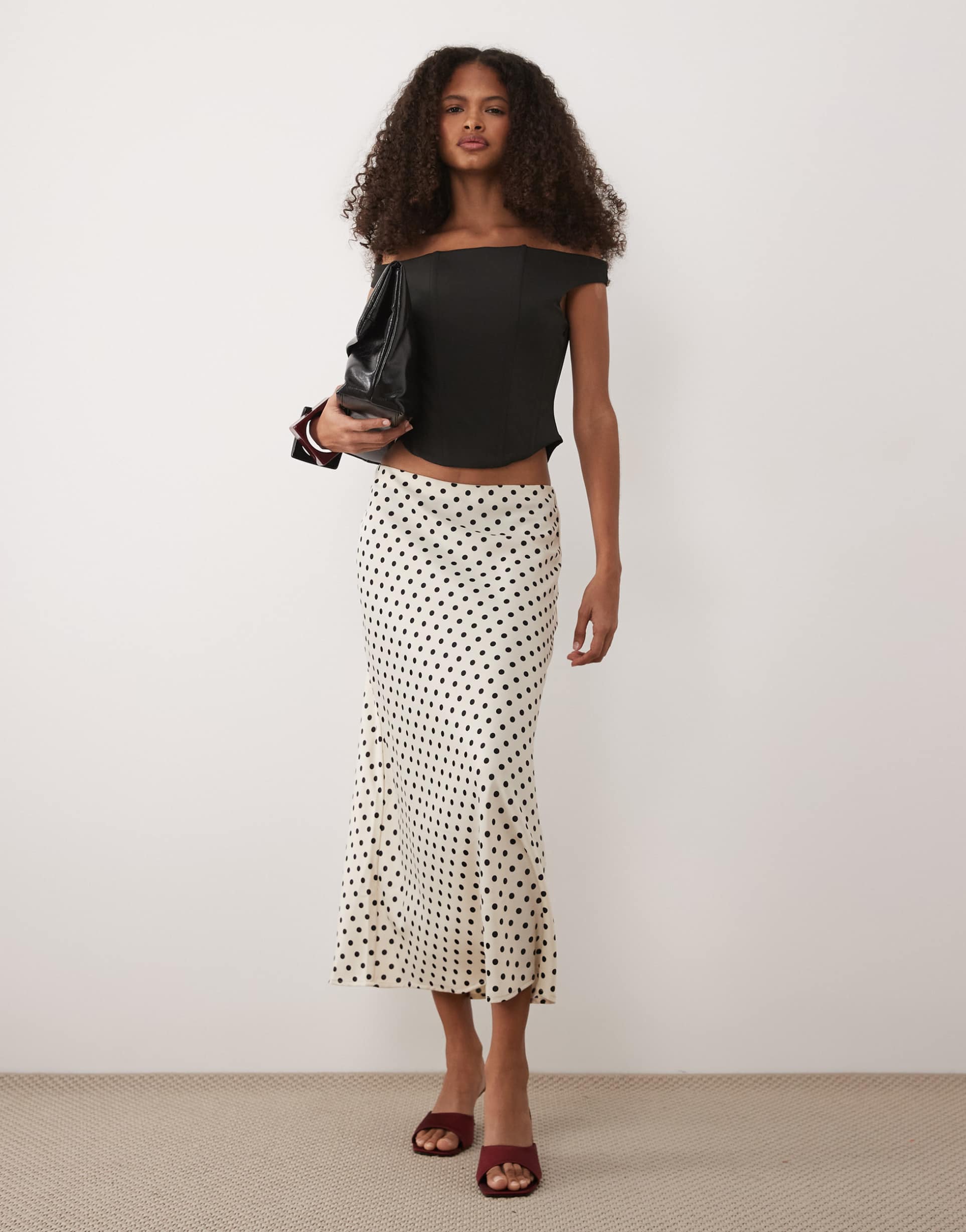 yas satin midi skirt in cream and black spot print