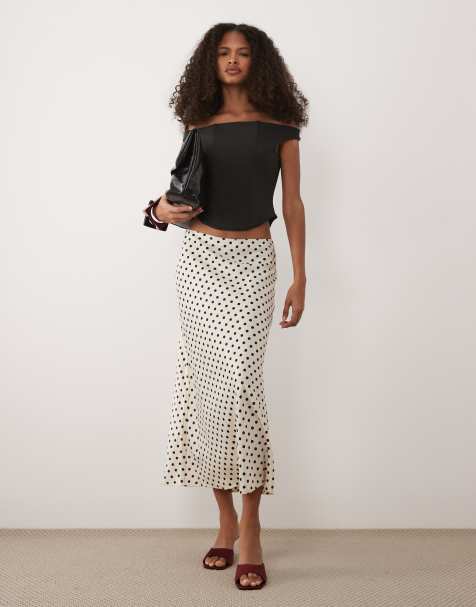 YAS satin midi skirt in cream and black spot print