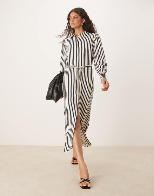 cream and black striped dress YAS tie waist maxi shirt in stripe Color:Sapphire Scrolls Paulina | White Embellished blue bridemaid dresses Striped midi inspired torso defInez the