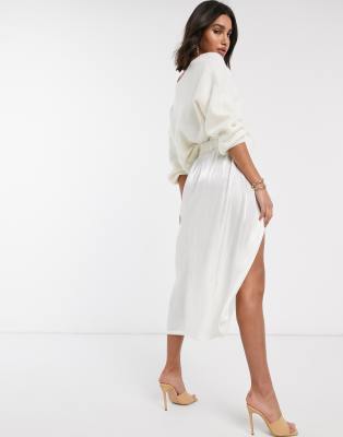 white wrap skirt and top