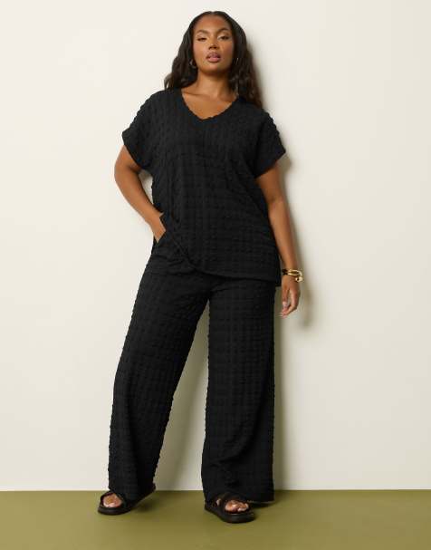 Yours Clothing Bubble textured wide leg trousers in black - view 1