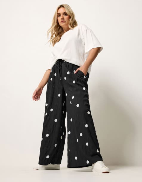 Yours Clothing Polka dot wide leg trousers in black - view 1