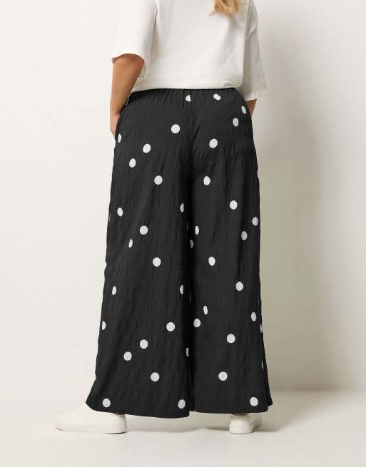 Yours Clothing Polka dot wide leg trousers in black, 4 of 4