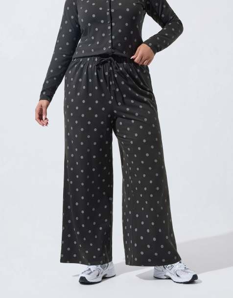 Yours Clothing Polka dot wide leg trousers in black - view 1