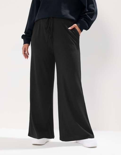 Yours Clothing Ribbed wide leg trousers in black, 2 of 4