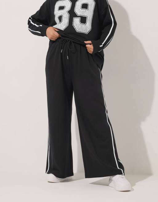Yours Clothing Wide leg side stripe joggers in black