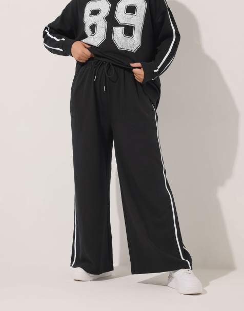 Yours Clothing Wide leg side stripe joggers in black - view 1