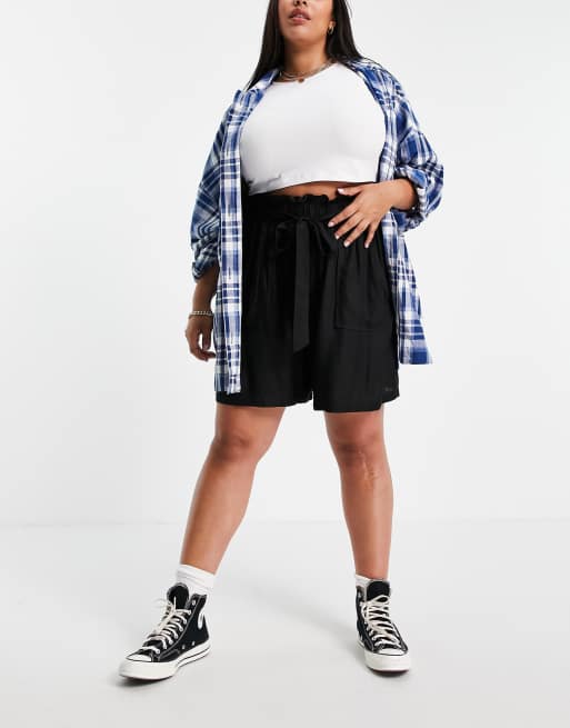 Yours Exclusive tie waist flippy shorts in black ASOS