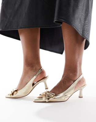 sling back pumps in gold