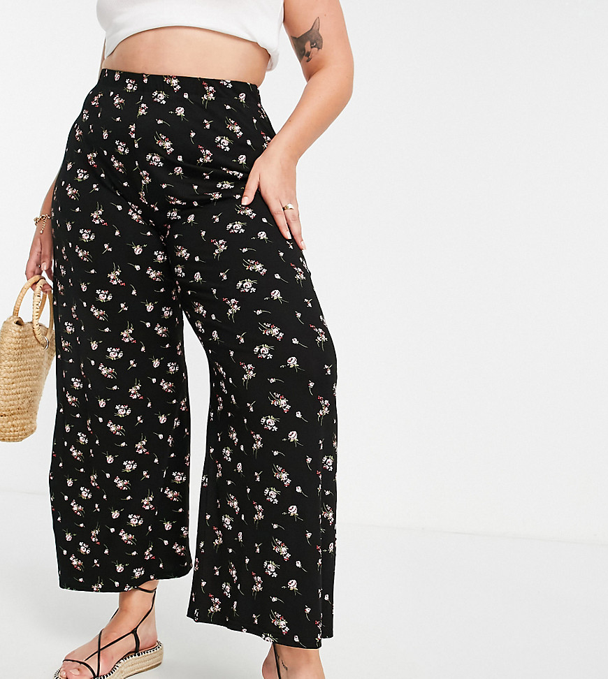 Plus-size trousers by Yours Always here for floral print High rise Elasticated waist Wide leg Regular fit