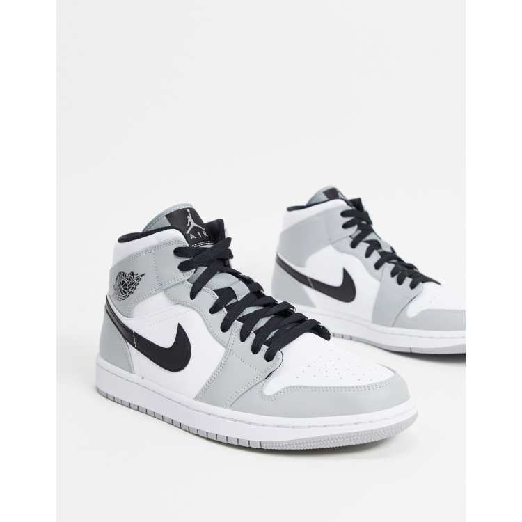 Zapatillas en gris y blanco Jordan 1 Nike | ASOS