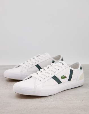 Zapatillas blancas con rayas laterales verdes de Lacoste-Blanco